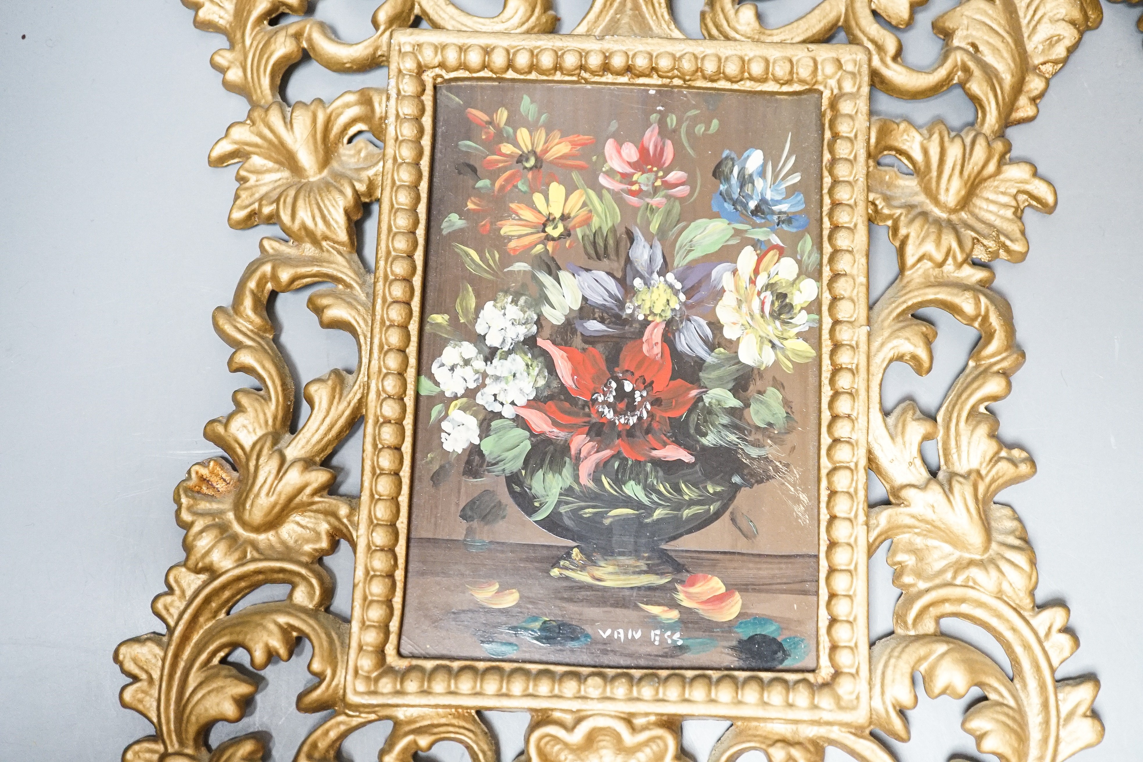 A pair of gilt metal framed still life plaques